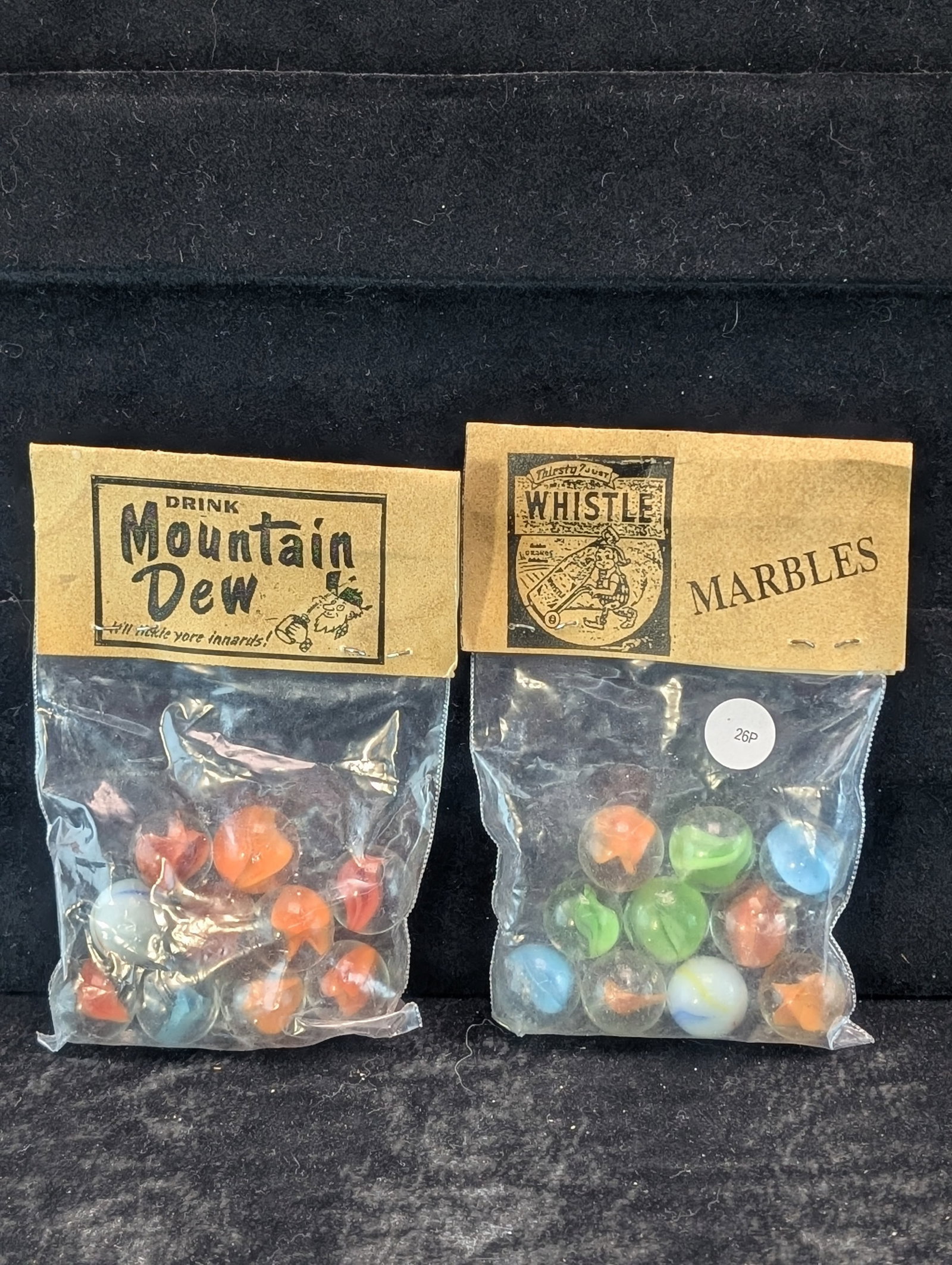 Mountain Dew and Whistle Marbles in sealed Bags: Mountain Dew and Whistle Marbles in sealed Bags