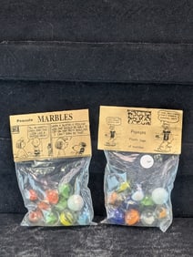 Peanuts and Popeyes;  Marbles in sealed Bags