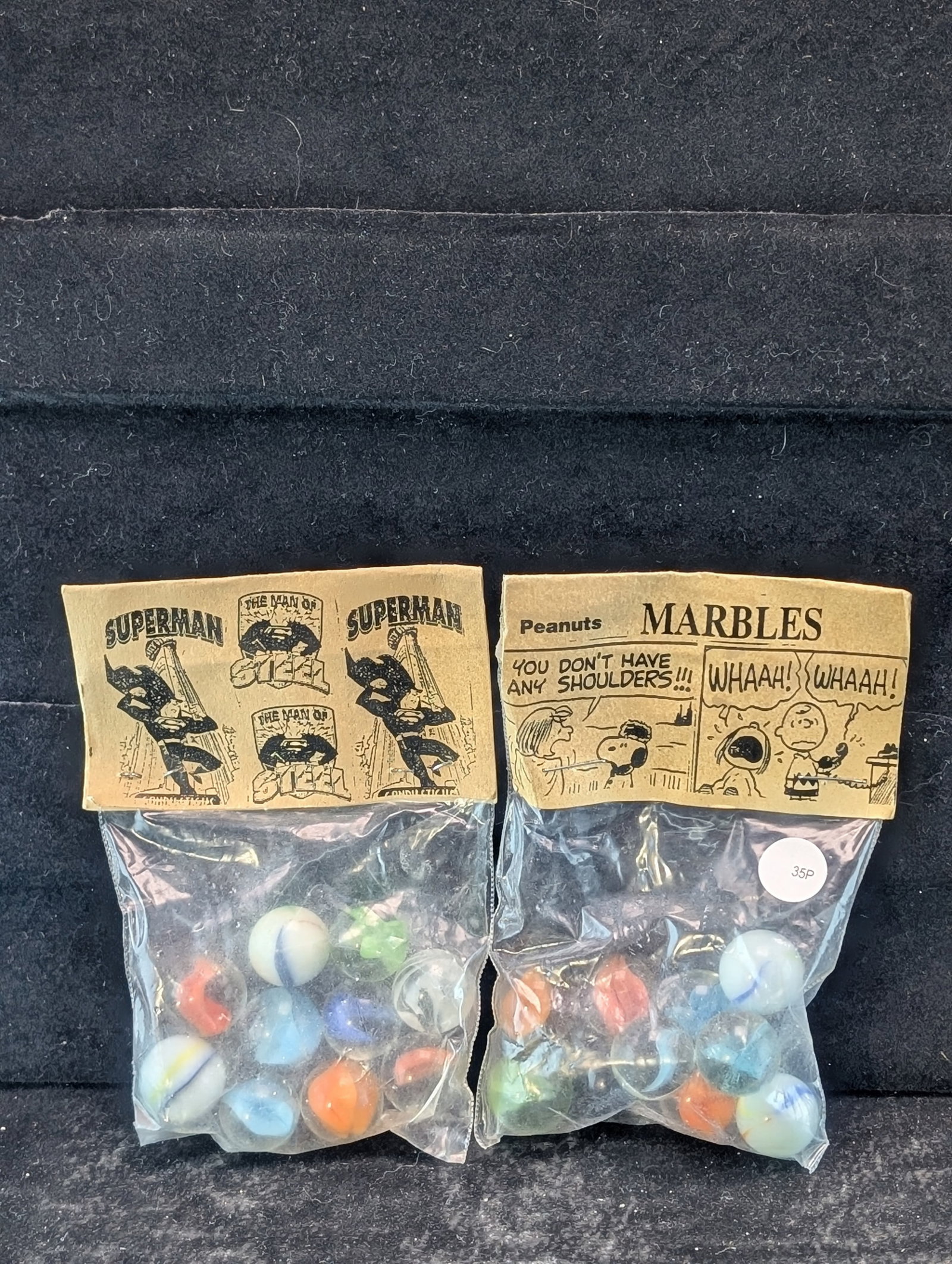 Superman and Peanuts; Marbles in sealed Bags: Superman and Peanuts; Marbles in sealed Bags