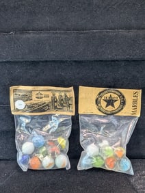 Standard and Texaco;  Marbles in sealed Bags