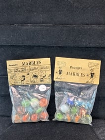 Peanuts and Popeyes;  Marbles in sealed Bags