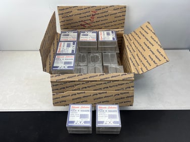 Box of Ultimate Collection Unused Hockey Puck Square Cases