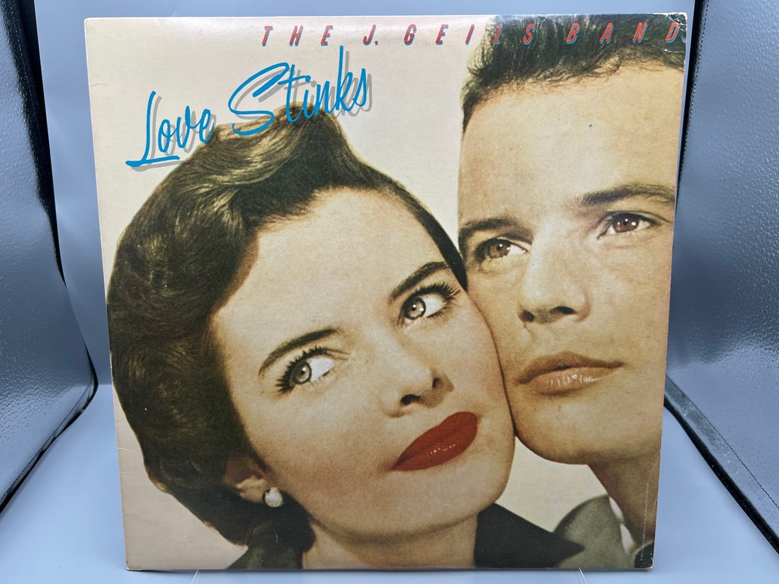 1980 The J. Geils Band Love Stinks Vinyl Album - SOO-17016: 1980 The J. Geils Band Love Stinks Vinyl Album - SOO-17016- Records have not been tested by the auction house for play quality. All items are sold as is.