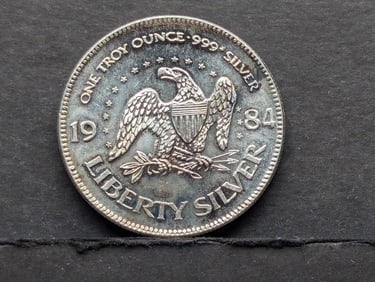 Silver Round, 1 oz .999 Fine; 1984 "Liberty Bell Dollar" On Obverse, Liberty Eagle On Reverse