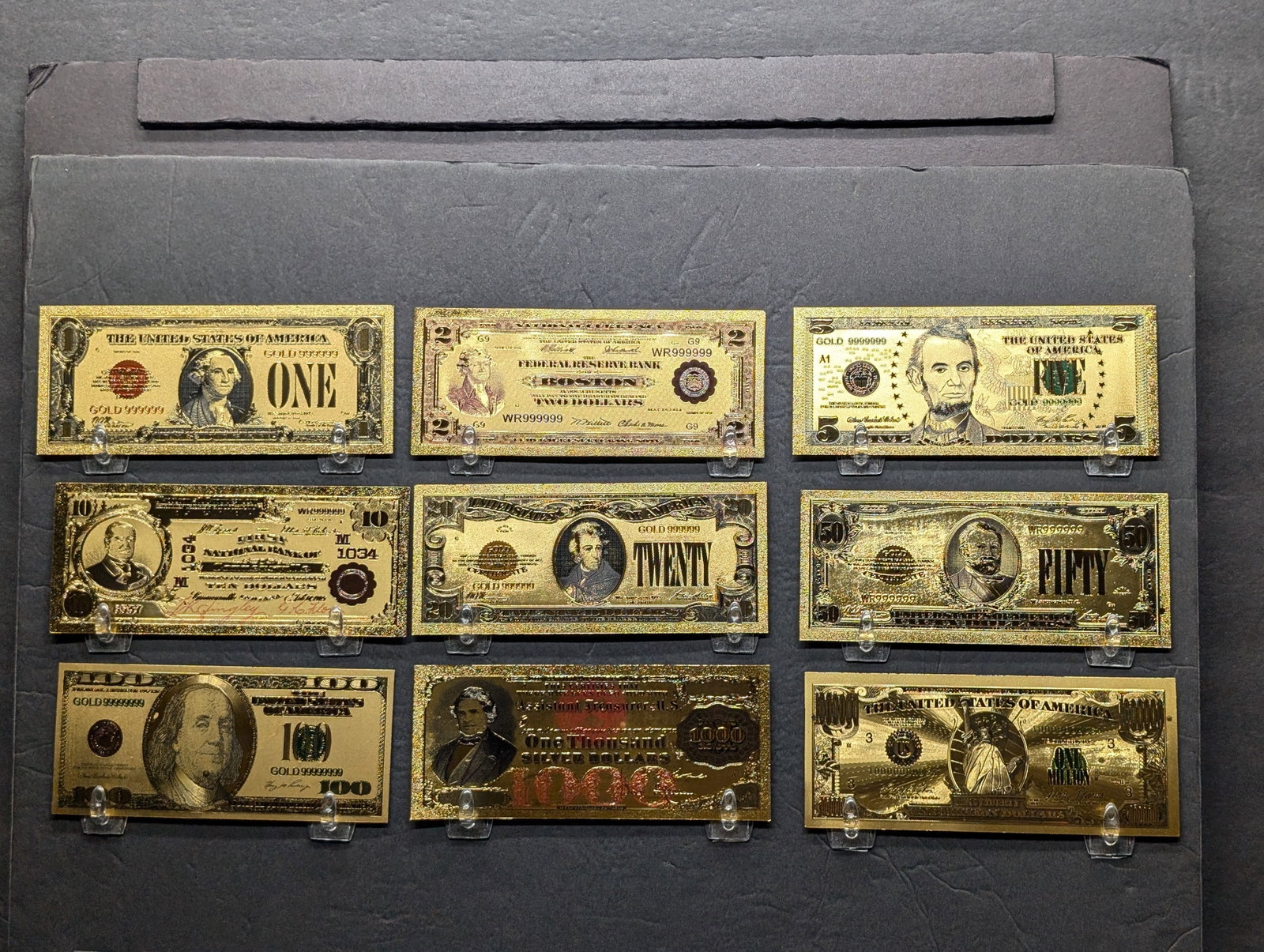 Lot Of Nine Gold Foil Polymer Notes, Sequence of $1 to $1MM: Lot Of Nine Gold Foil Polymer Notes, Sequence of $1 to $1MM
