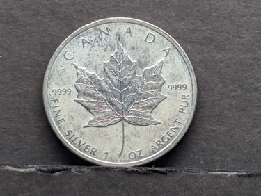 1 Oz. .9999 Fine SILVER 2011 Canada $5 Maple Leaf Designed Coin