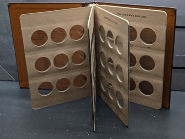 Dansco 8176 Eisenhower Dollar slide album including proofs. Used but Very nice.