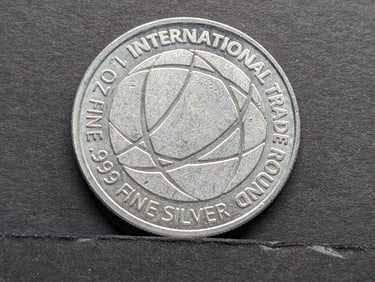 1 Oz. .999 Fine SILVER International Trade Rounds Designed Coin