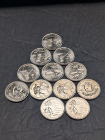 (12) Uncirculated District of Columbia & Territories Quarters 6 each P and D