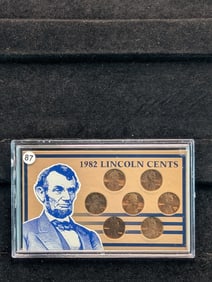 1982 United States Minted Lincoln Penny Set RED and (44 count) Roll of 1969 S RED Memorial Pennies