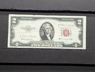 1953-C Red Seal 2 Dollar Bill with good corners and no writing.