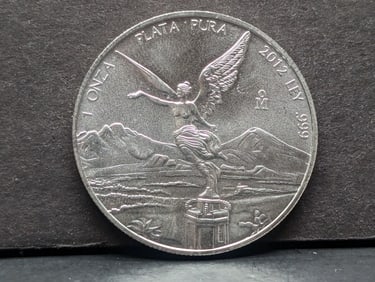 1 Oz. .999 PURE SILVER 2012 Mexico Libertad Designed Round