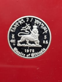 1972 Horn of Africa country .999 silver $5 in nice display. Pictures Emperor Haile Selassie. GEM.