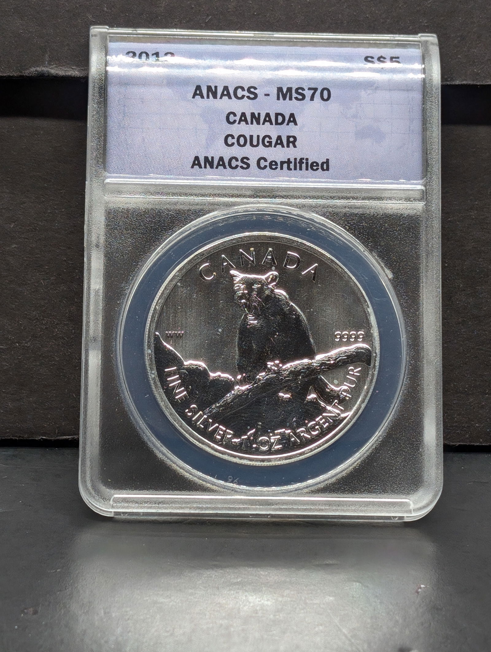 2012 Canada $5, Cougar. Slabbed by ANACS, respected grader, as perfect MS 70, Deep Cameo. (1 of 3)