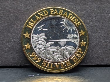 Limited Edition $10 Casino Token with .999 silver center: Norwegian Cruise Lines, Island Paradise.