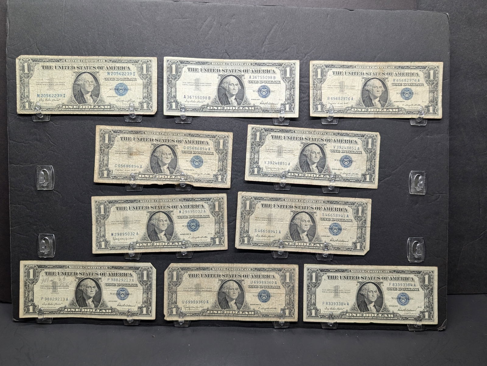 (1) 1935-E, (4) 1957, (2) 57-A, (3) 57-B Series $1.00 Silver Certificates (1 of 5)