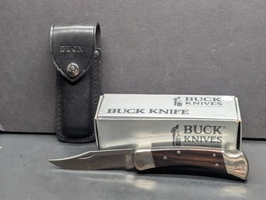 Buck Knife Model 110 Folding Hunter Knife 1987 25th Anniversary Beautifully engraved blade with