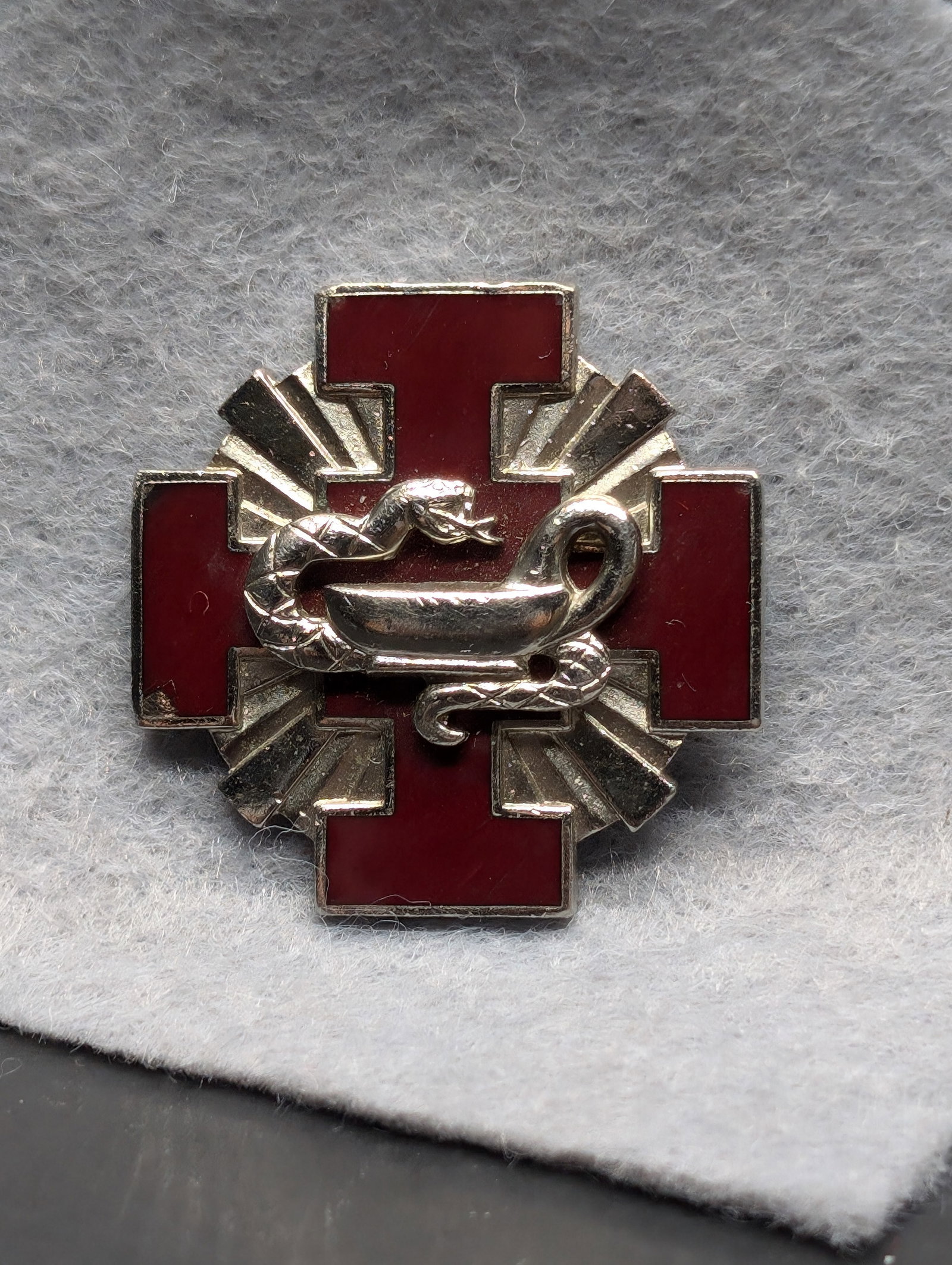 1 pin made by N.S. Meyer Inc N.Y mid 60's to mid 70's Jerusalem Cross with Snake: Vintage Pharmacy Insignia Pin. Features a striking red cross with a detailed snake and bowl centerpiece, symbolizing medical heritage. Crafted with a metallic finish and enamel accents. Shows minor we