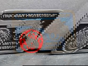 SMITH & WESSON Handgun Belt Buckle This Body Protected by" enameled Vintage NOS