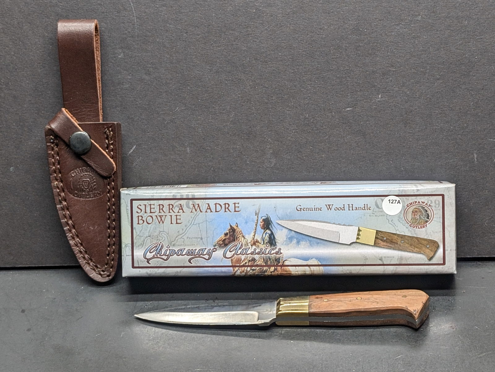 Chipaway Cutlery Sierra Madre Bowie Fixed Blade Knife w/Wood Handles 7.5 Inch Overall Hunting Knife: Chipaway Cutlery Sierra Madre Bowie Knife. Features a classic design with a 5-inch stainless steel blade, marked "Pakistan" on the blade. The handle is crafted from genuine wood with brass accents for
