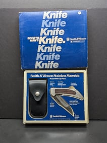 1980 Smith and Wesson Model 6061 Clip Point Stainless Steel Maverick Rosewood inlays and leather