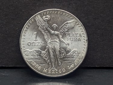 1986 Mexican Silver Libertad Round. One Troy Ounce Silver.999 Fine