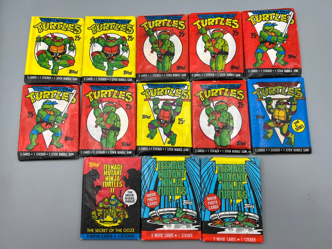 Lot of (13) 1980s & 90s Topps Teenage Mutant Ninja Turtles Unopened Wax Packs (1 of 2)