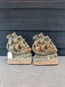 Pair Of Cast Iron Bookends Featuring A Sailing Ship