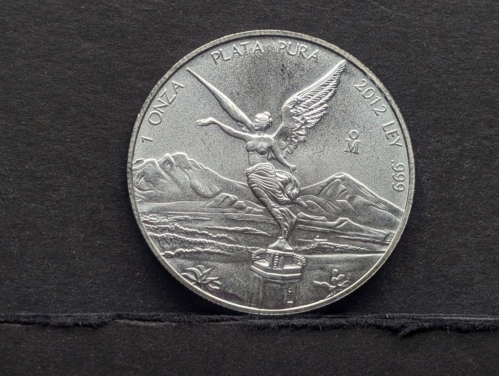 1 Oz. .999 PURE SILVER 2012 Mexico Libertad Designed Round: 1 Oz. .999 PURE SILVER 2012 Mexico Libertad Designed Round