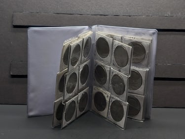Lot of 30 Eisenhower Dollars in Collector's Album (1971-1978 Including Bicentennial)