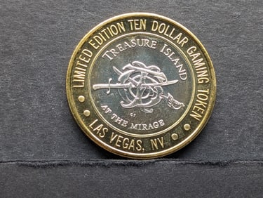 Limited Edition $10 Casino Token with .999 silver center: Treasure Island at the Mirage Las Vegas.