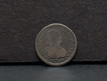 1799 Chile 90% silver one half reale. Predecessor to our dime. Nice original coin. Great detail on