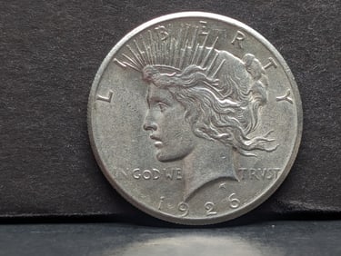 1926 Peace Dollar. Mint luster.