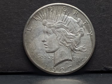 1927 Peace Dollar. Nice detail. Second lowest mintage in series,