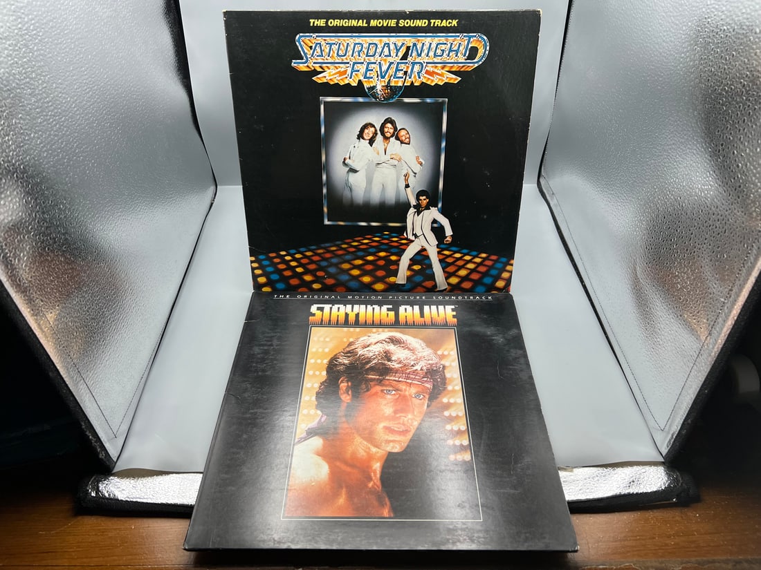 John Travolta Soundtracks (2 LP Lot): Saturday Night Fever (1977), gatefold, 2 LPs; and Staying (1 of 4)