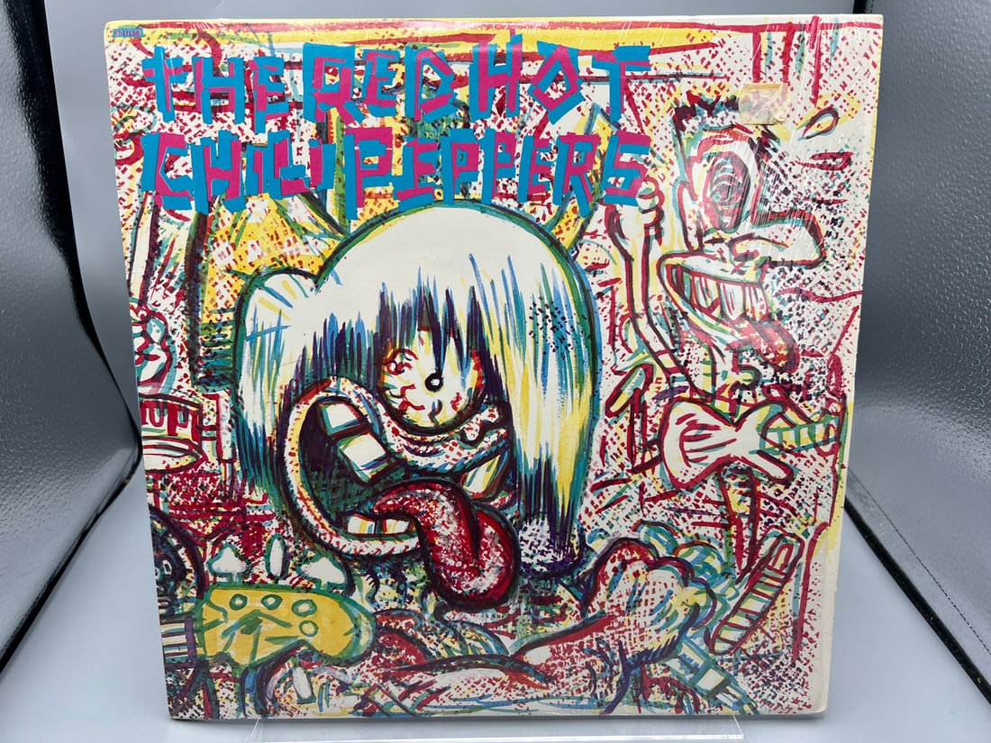 The Red Hot Chili Peppers: Self-titled (1984), the band's highly sought first album: The Red Hot Chili Peppers: Self-titled (1984), the band's highly sought first album - Records have not been tested by the auction house for play quality. All items are sold as is.