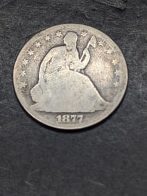**GOOD** 1877 w/ Motto Seated Liberty Half Dollar