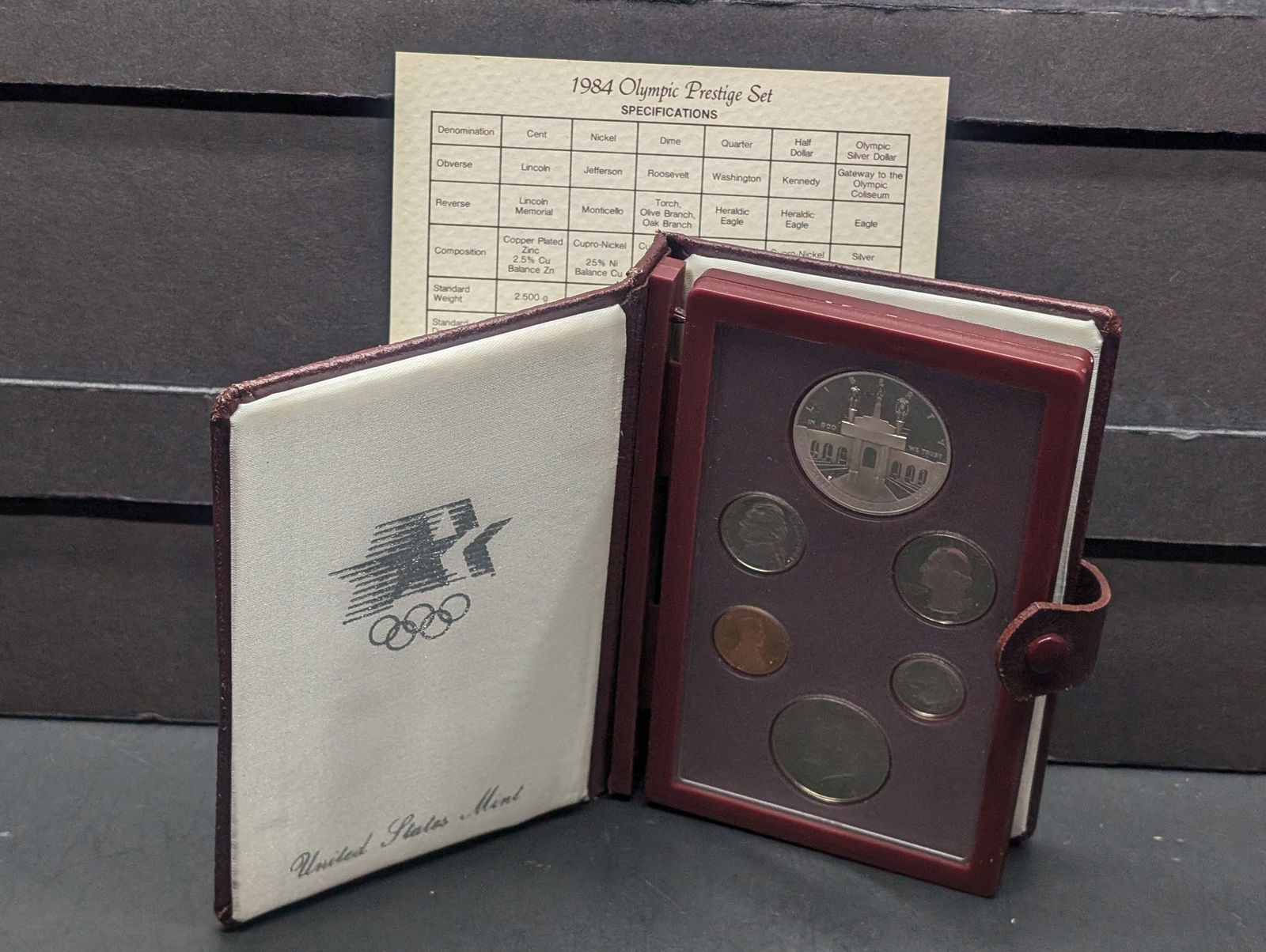 1984-S U.S. Mint Prestige Set w/ COA - Including Olympic Coliseum Commemorative Silver Dollar (1 of 5)