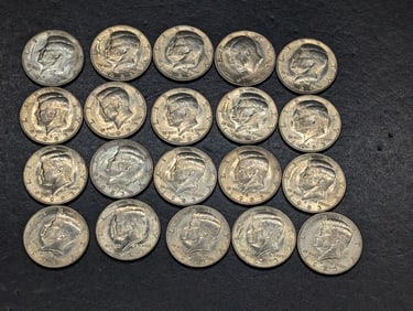 Original roll, 1983 Kennedy Halves. Much better date. Grey Sheet Wholesale $80.00, if you can find