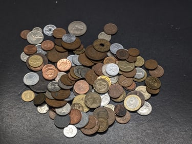 16 ounces plus unsearched foreign coins. Nice mix.