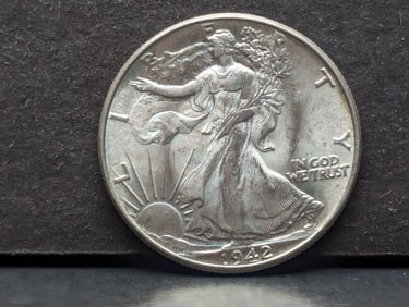 1942 Walking Liberty Half. Choice BU from original roll. Super brilliance.