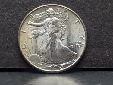 1943 Walking Liberty Half. Choice BU from original roll. Super brilliance.