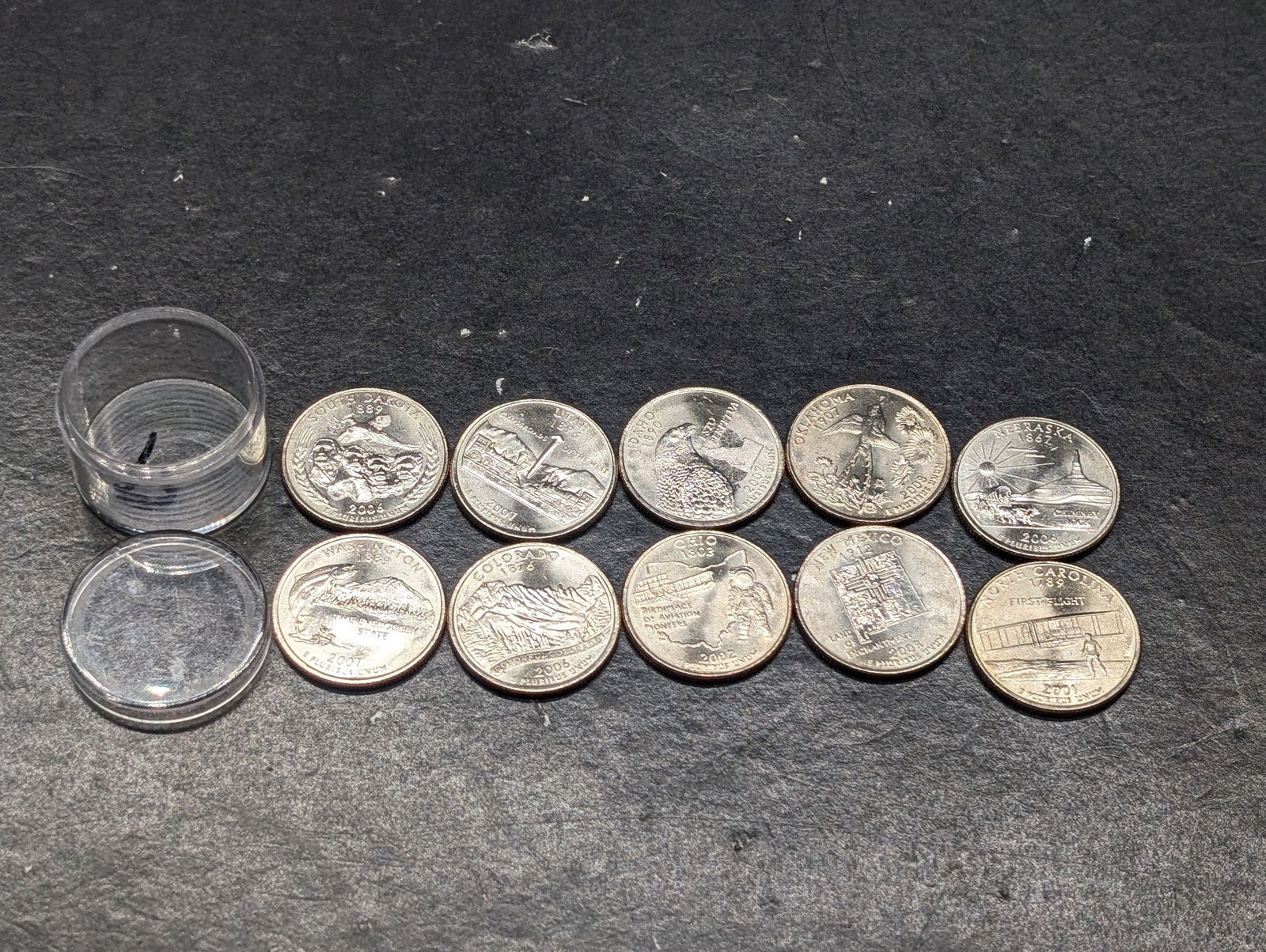 (10) Uncirculated "P" mixed date State Quarters (1 of 4)