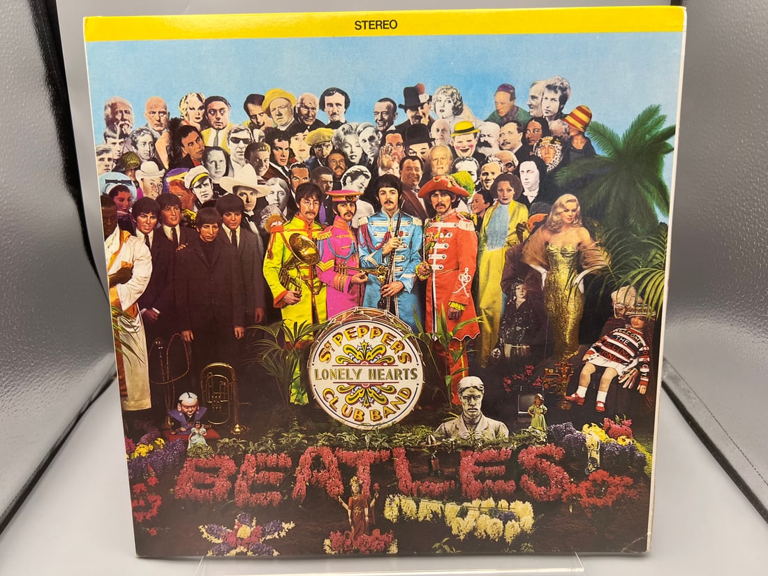 1978 The Beatles Sgt. Pepper's Lonely Hearts Club Band Reissue Limited Edition Canada Release: 1978 The Beatles Sgt. Pepper's Lonely Hearts Club Band Reissue Limited Edition Canada Release Gray/Pink Marble Vinyl Album - SEAV-11840 - Records have not been tested by the auction house for play qua