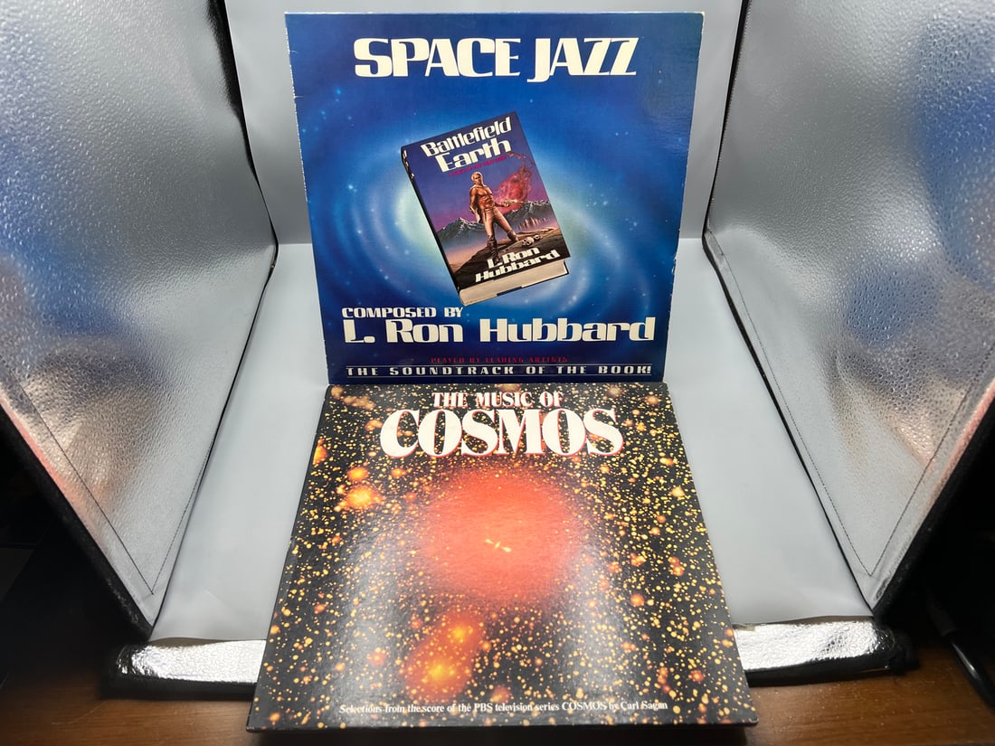 1982 L. Ron Hubbard Space Jazz & 1981 Various Artist The Music of Cosmos Vinyl Albums - ABL1-4003 &: 1982 L. Ron Hubbard Space Jazz & 1981 Various Artist The Music of Cosmos Vinyl Albums - ABL1-4003 & APLP 9000 - Records have not been tested by the auction house for play quality. All items are sold a