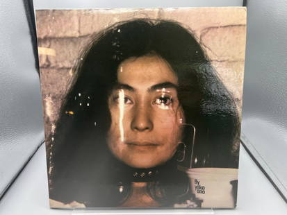 1971 Yoko Ono Fly Vinyl Album W/ Original Poster - SVBB 3380: 1971 Yoko Ono Fly Vinyl Album W/ Original Poster - SVBB 3380 - Records have not been tested by the auction house for play quality. All items are sold as is.