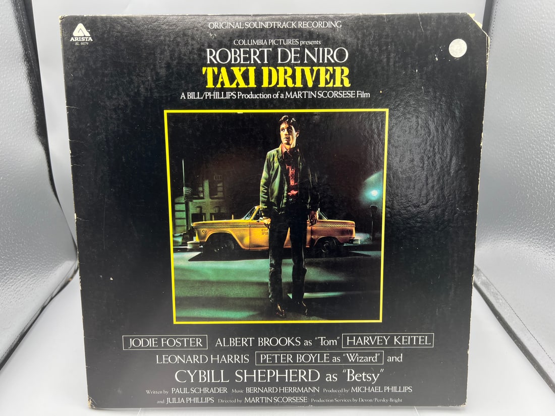 1976 Taxi Driver Original Soundtrack Recording Promo Vinyl Album - Very Rare - AL 4079: 1976 Taxi Driver Original Soundtrack Recording Promo Vinyl Album - Very Rare - AL 4079 - Records have not been tested by the auction house for play quality. All items are sold as is.
