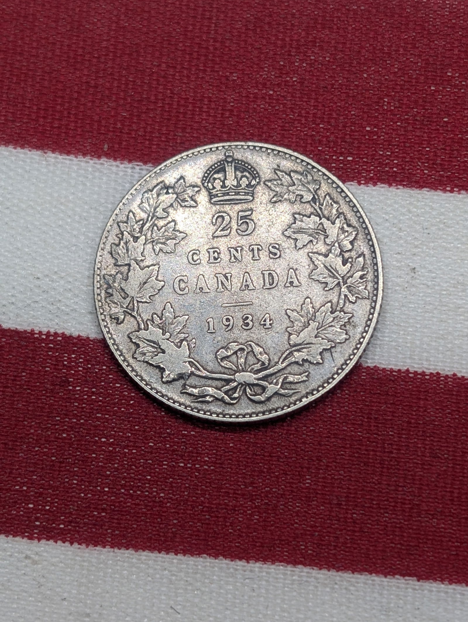 1934 Canada Key Date 25 Cents. George V Portrait. Mintage, 384,350. (1 of 2)