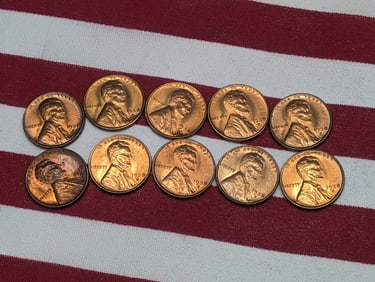 Ten 1938-S Brilliant Uncirculated Lincoln Head Wheat Cents.
