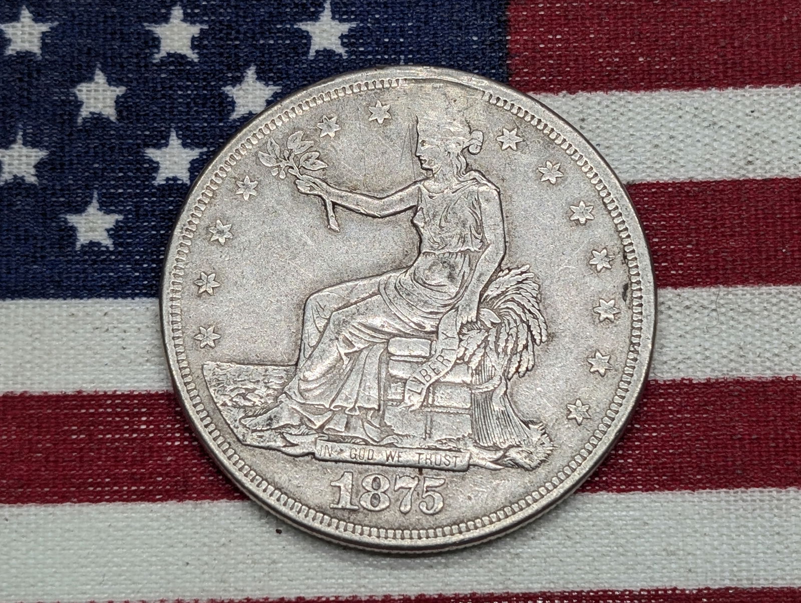 **VF+** 1875-CC Silver Trade Dollar,  Holed & Repaired (1 of 2)